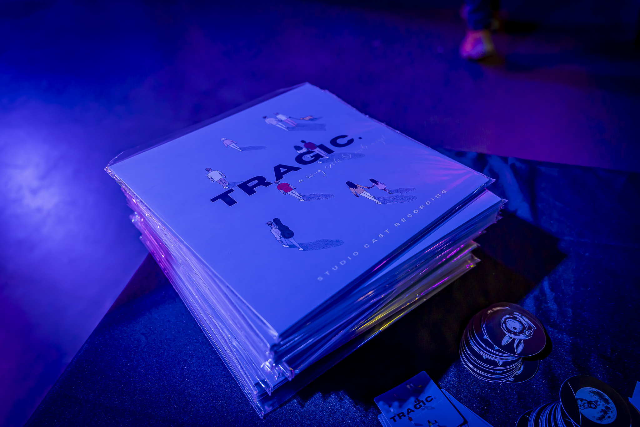Copies of the tragic. studio cast album by Indy Angel at its 2026 launch